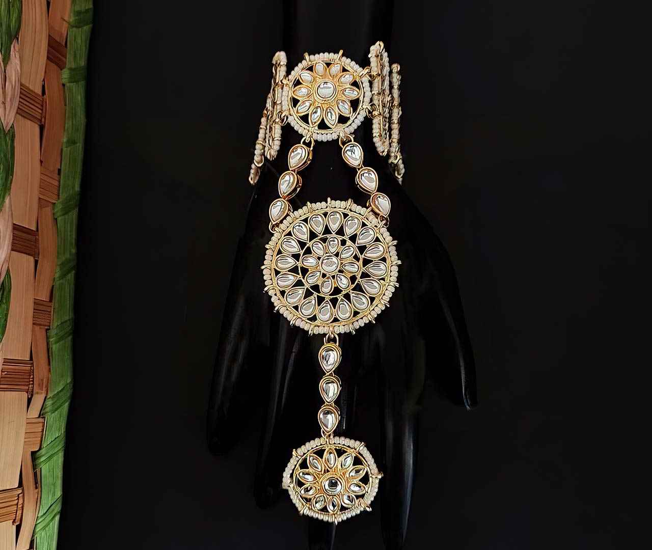 kundan haath paan with 3 round shape with kundan stone attached with each other with kundan chain